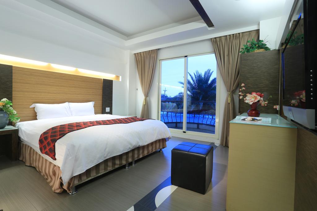 Spring Fountain Hotel Цзяоси Номер фото