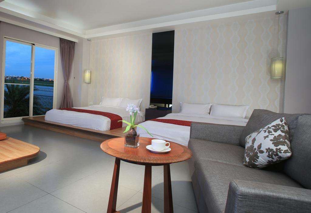Spring Fountain Hotel Цзяоси Номер фото